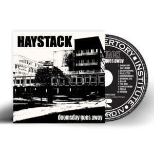 Haystack's 'Doomsday Goes Away' CD in a limited edition mini vinyl-gatefold-style packaging, featuring the disc half-inserted, showcasing the unique on-body label design.